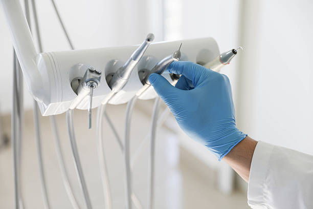 Professional Emergency Dentist technician working in Arden-Arcade, CA